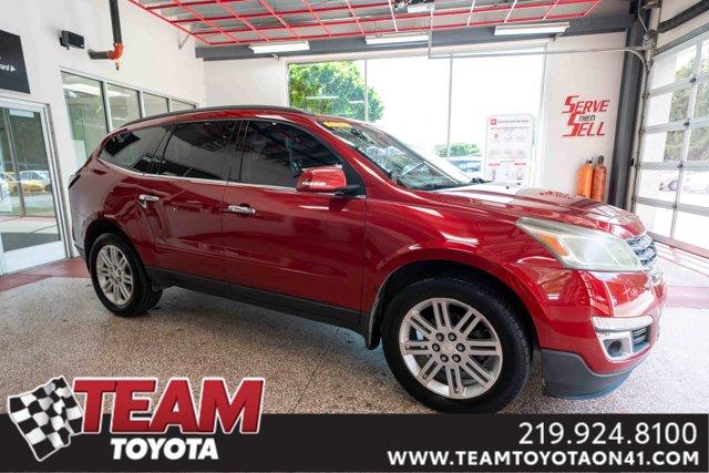 Photo of 2013 Crystal Red Tintcoat Chevrolet Traverse