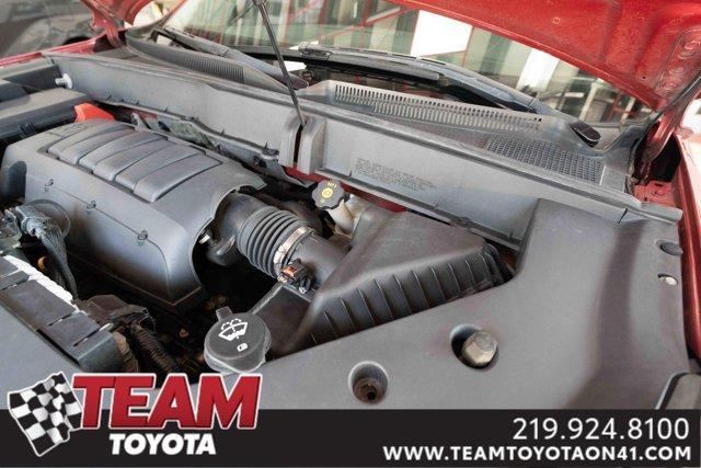 Photo of 2013 Crystal Red Tintcoat Chevrolet Traverse