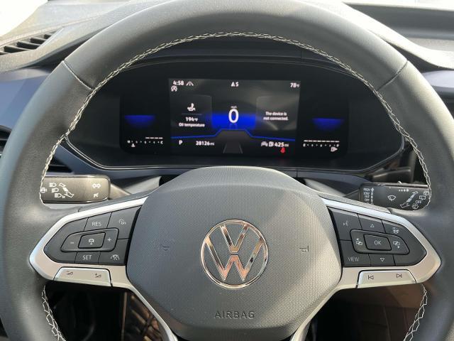 Photo of 2023 Cornflower Blue Volkswagen Taos