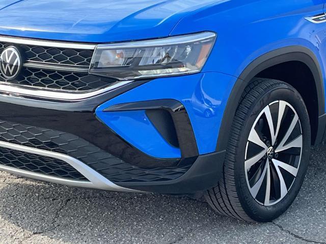 Photo of 2023 Cornflower Blue Volkswagen Taos