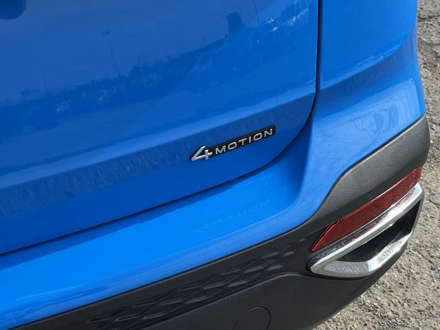 Photo of 2023 Cornflower Blue Volkswagen Taos