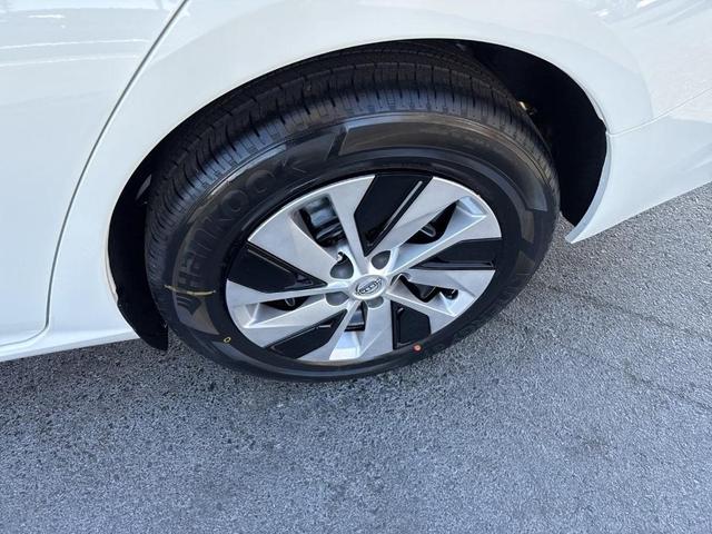 Photo of 2025 Glacier White Nissan Altima