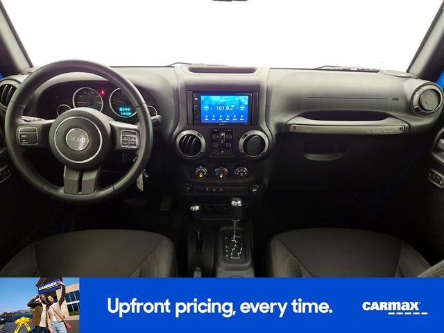 Photo of 2015 Blue Jeep Wrangler