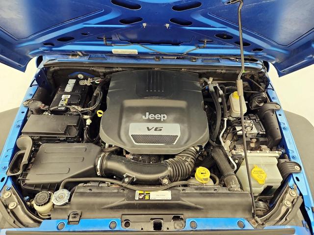 Photo of 2015 Blue Jeep Wrangler