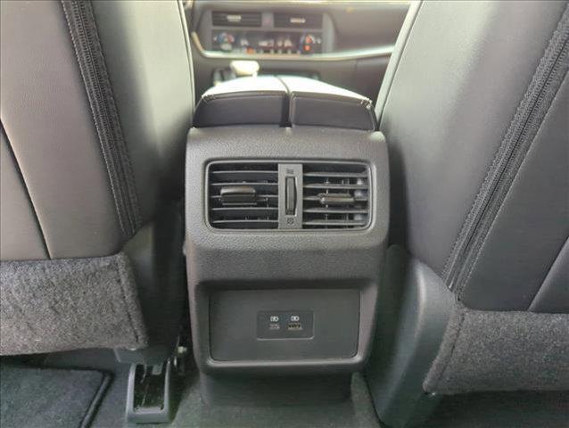 Photo of 2023 Pearl White Tricoat Nissan Rogue