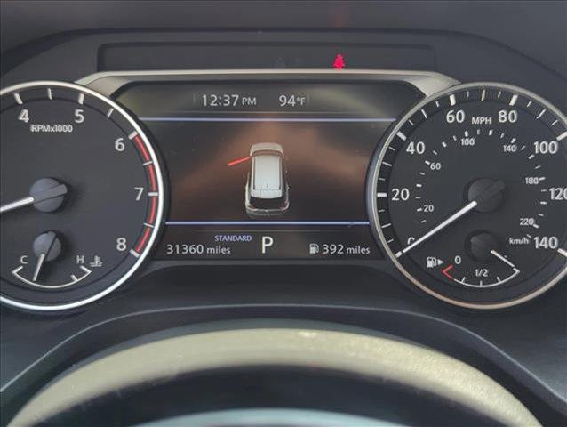 Photo of 2023 Pearl White Tricoat Nissan Rogue
