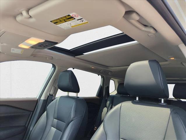 Photo of 2023 Pearl White Tricoat Nissan Rogue