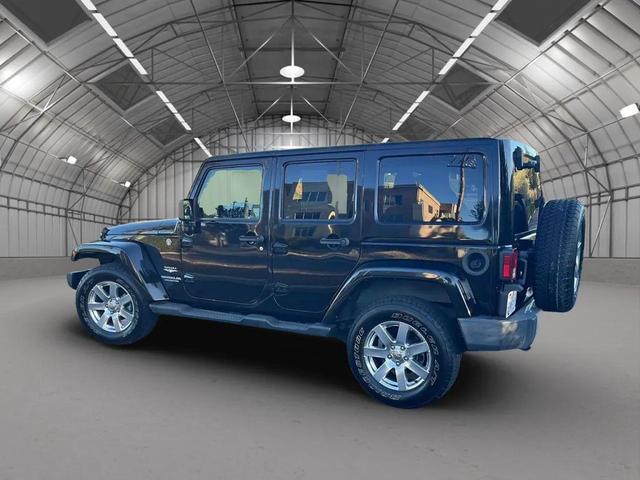 Photo of 2012 Black Clearcoat Jeep Wrangler Unlimited
