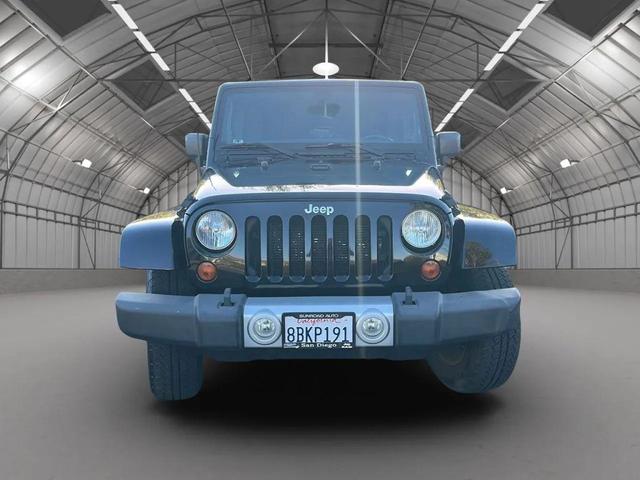 Photo of 2012 Black Clearcoat Jeep Wrangler Unlimited