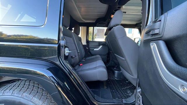 Photo of 2012 Black Clearcoat Jeep Wrangler Unlimited