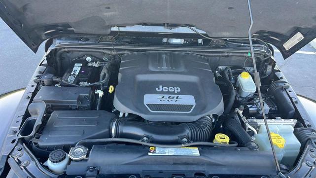 Photo of 2012 Black Clearcoat Jeep Wrangler Unlimited