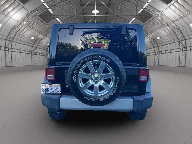 Photo of 2012 Black Clearcoat Jeep Wrangler Unlimited