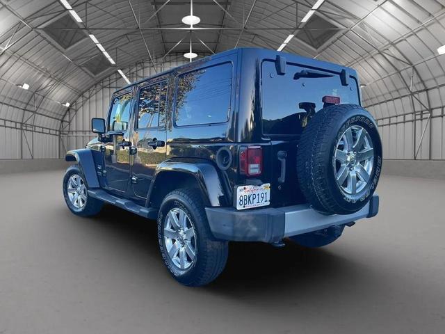 Photo of 2012 Black Clearcoat Jeep Wrangler Unlimited