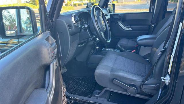 Photo of 2012 Black Clearcoat Jeep Wrangler Unlimited