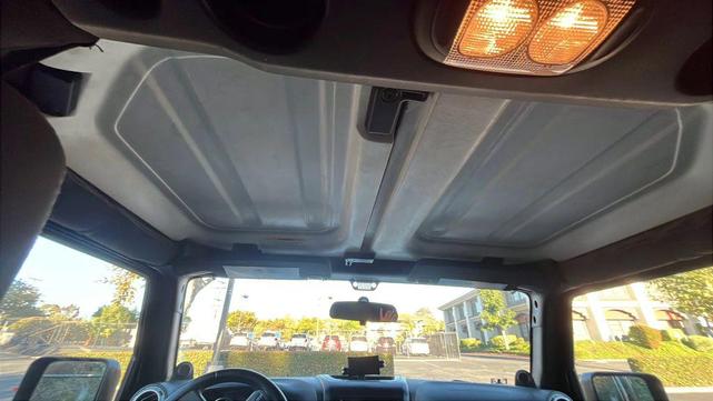 Photo of 2012 Black Clearcoat Jeep Wrangler Unlimited