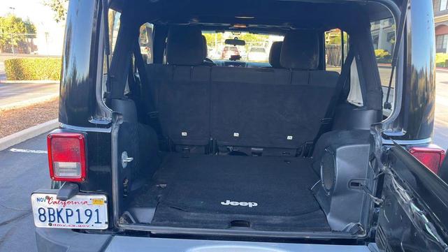 Photo of 2012 Black Clearcoat Jeep Wrangler Unlimited