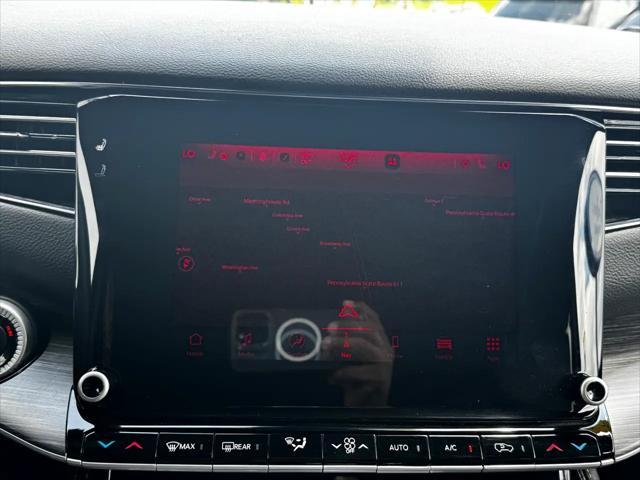 Photo of 2023 Diamond Black Crystal Pearlcoat Jeep Wagoneer L