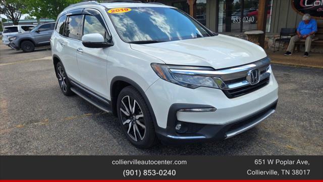 Photo of 2019 White Honda Pilot