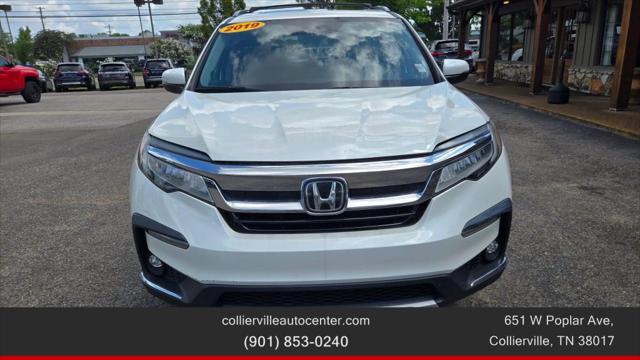 Photo of 2019 White Honda Pilot
