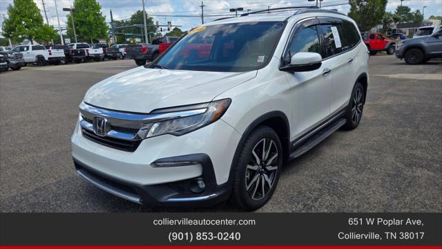 Photo of 2019 White Honda Pilot