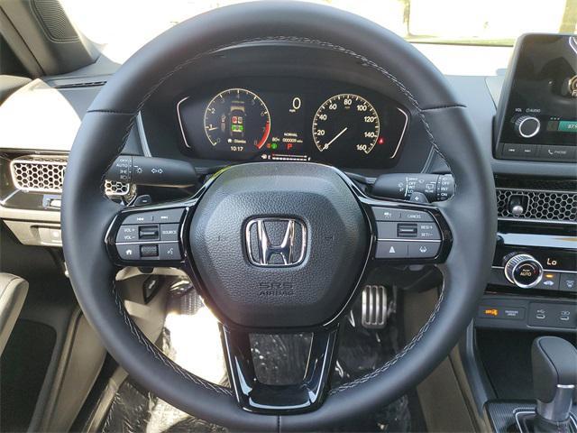 Photo of 2025 Boost Blue Pearl Honda Civic