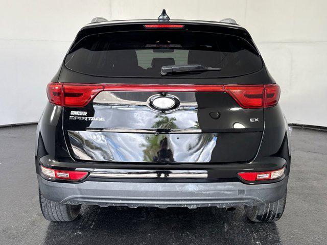 Photo of 2018 Black Cherry Kia Sportage