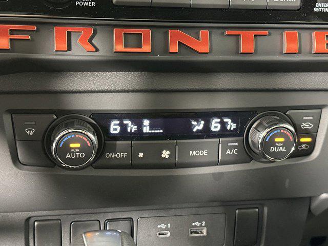 Photo of 2025 Boulder Gray Pearl Nissan Frontier