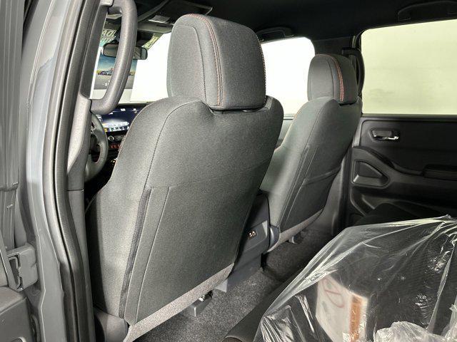 Photo of 2025 Boulder Gray Pearl Nissan Frontier