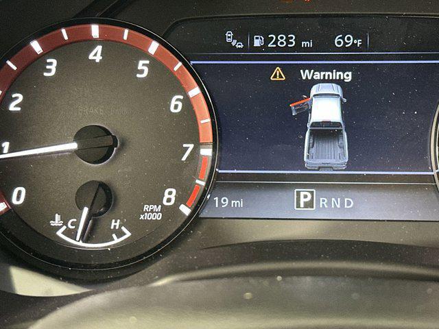 Photo of 2025 Boulder Gray Pearl Nissan Frontier