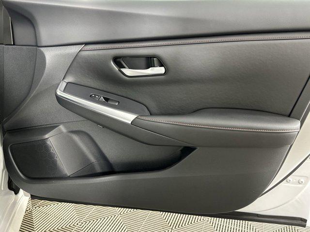 Photo of 2024 Aspen White Tricoat Nissan Sentra