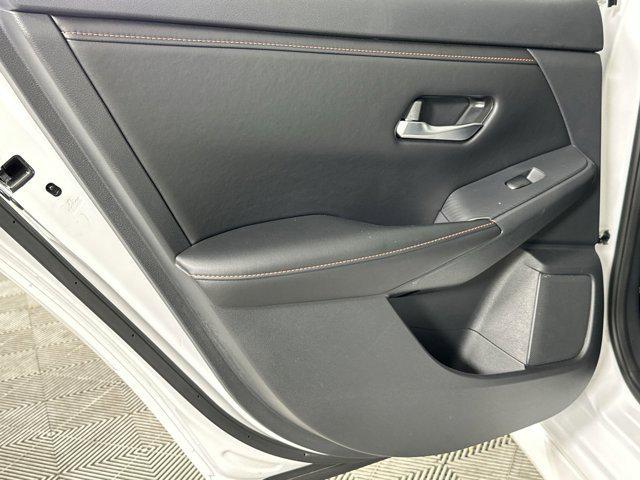 Photo of 2024 Aspen White Tricoat Nissan Sentra
