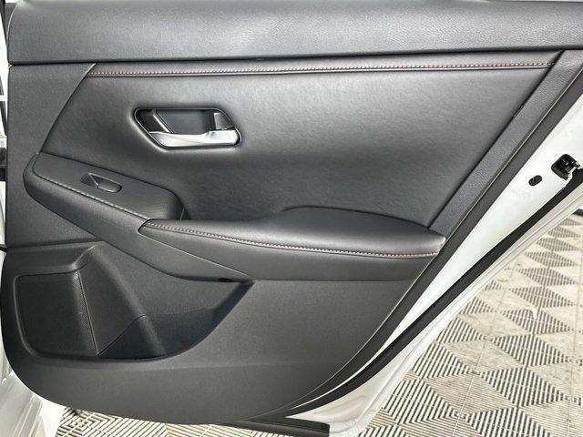 Photo of 2024 Aspen White Tricoat Nissan Sentra