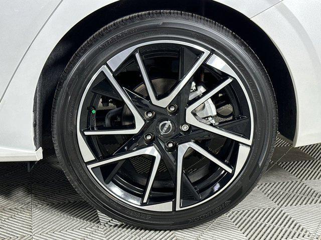 Photo of 2024 Aspen White Tricoat Nissan Sentra