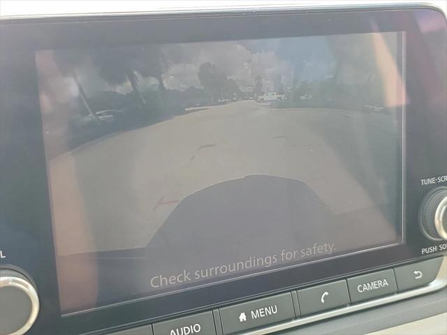 Photo of 2023 Scarlet Ember Tintcoat Nissan Rogue