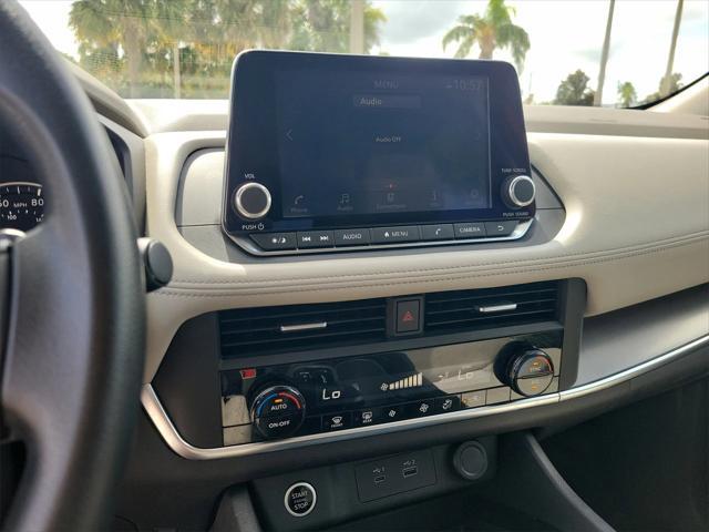 Photo of 2023 Scarlet Ember Tintcoat Nissan Rogue