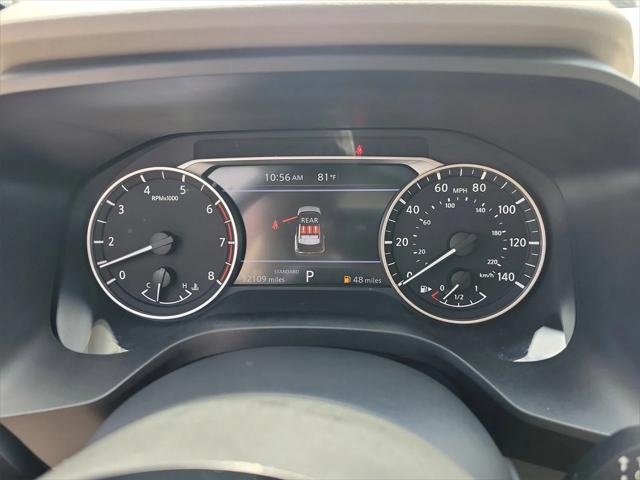 Photo of 2023 Scarlet Ember Tintcoat Nissan Rogue