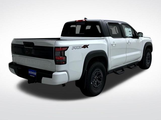 Photo of 2025 Glacier White Nissan Frontier
