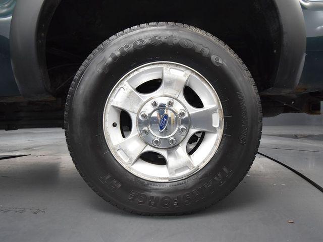 Photo of 2011 FOREST GREEN METALLIC Ford F-250