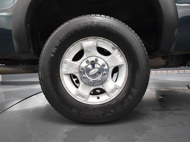 Photo of 2011 FOREST GREEN METALLIC Ford F-250