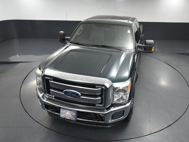 Photo of 2011 FOREST GREEN METALLIC Ford F-250