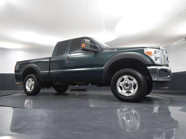 Photo of 2011 FOREST GREEN METALLIC Ford F-250