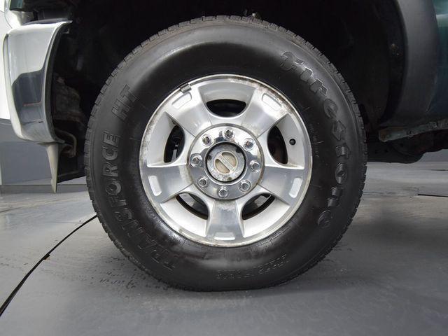 Photo of 2011 FOREST GREEN METALLIC Ford F-250