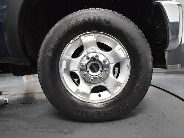 Photo of 2011 FOREST GREEN METALLIC Ford F-250
