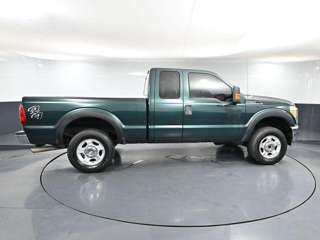 Photo of 2011 FOREST GREEN METALLIC Ford F-250
