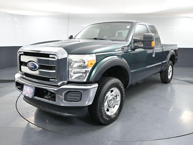 Photo of 2011 FOREST GREEN METALLIC Ford F-250