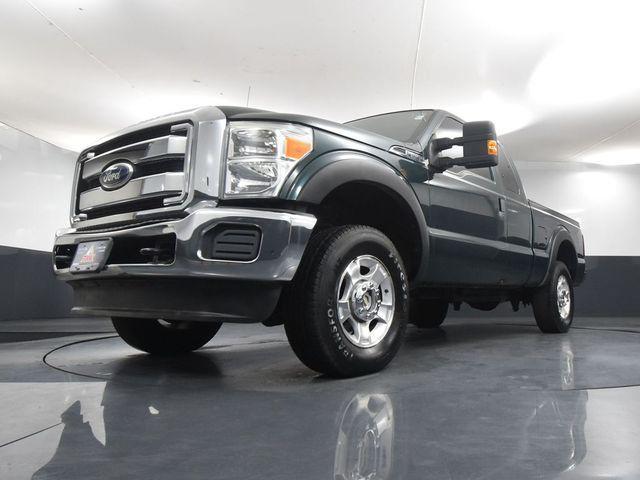 Photo of 2011 FOREST GREEN METALLIC Ford F-250