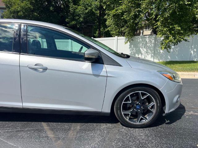 Photo of 2014 Ingot Silver Metallic Ford Focus