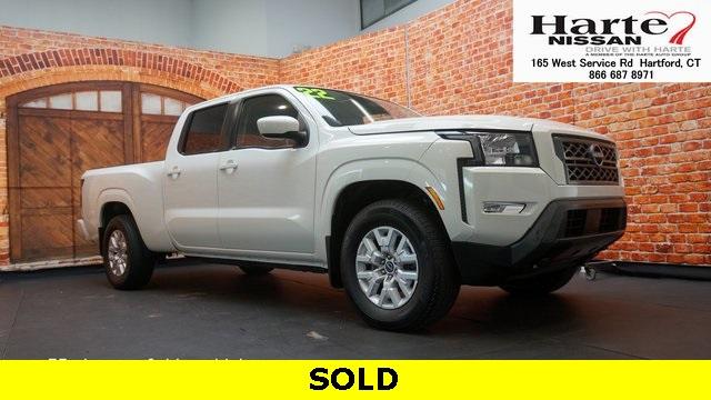 Photo of 2022 Glacier White Nissan Frontier