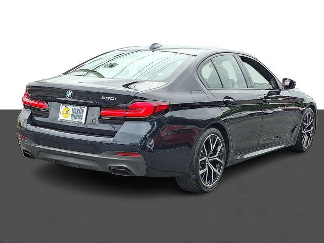 Photo of 2022 Carbon Black Metallic BMW 530