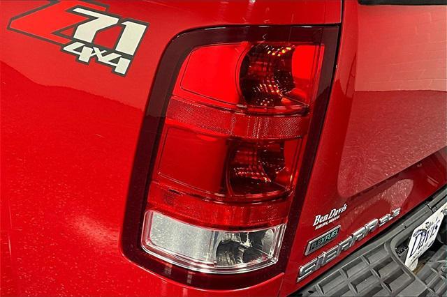 Photo of 2012 Fire Red GMC Sierra 1500